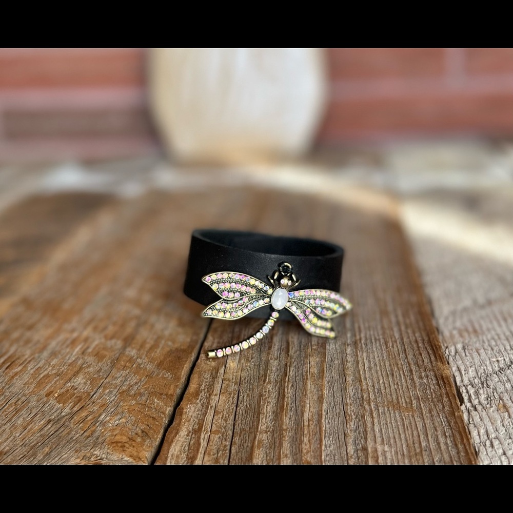 Black leather bracelet with dragonfly charm